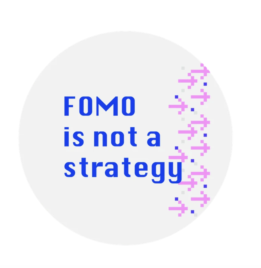 A round, white sticker with computer font that says "FOMO is not a strategy" in blue letters and some pink and blue arrows going off to the right