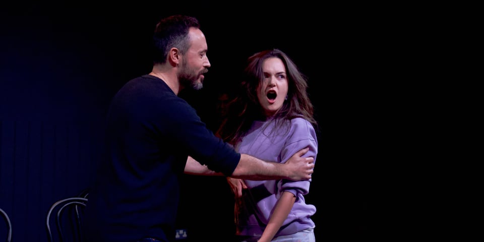 Alex Smith on stage.