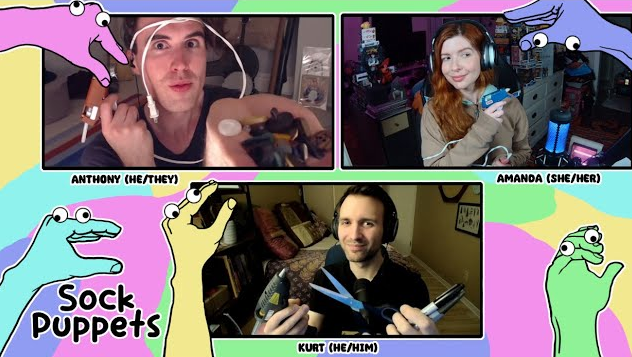 A thumbnail for a liveplay with my friends, who kindly joined me for a session online. We’re all holding crafting materials. The image shows colourful drawings with hands, each hand with googley eyes on it. The three of us are identified as Anthony, Amanda and Kurt.