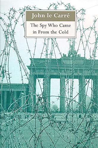 The Brandenburg Gate in Berlin, Germany is seen out of focus through a wall of barbed wire. The colours are all sepia. The words at the top John le Carre The Spy Who Came in From the Cold.