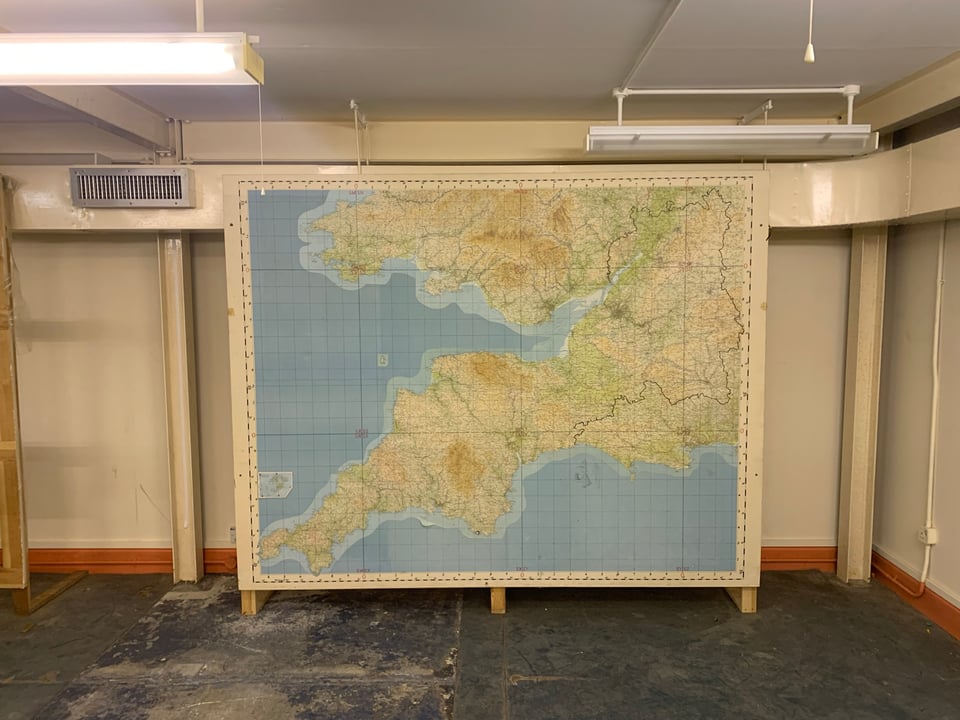 A large, room high, OS map of the West Country, including some of South Wales and as east as perhaps Southampton. It's been mounted on a wooden false wall in front of the bunker's internal walls.