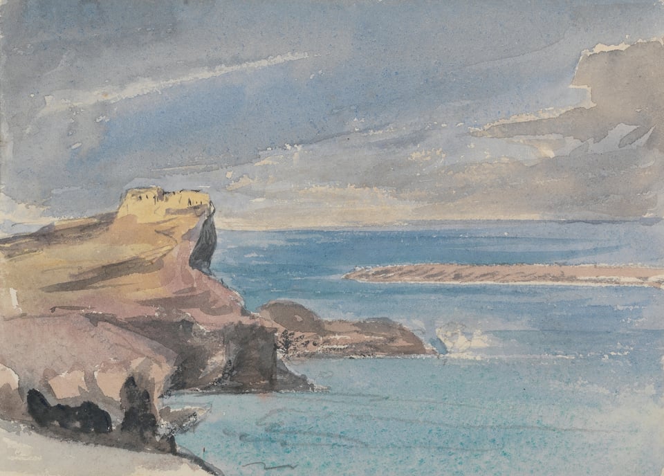 View from a coast near a deep blue sea under a grey sky