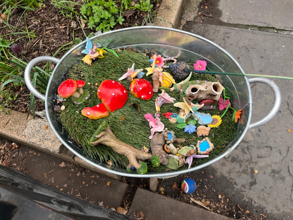 brooklyn garden cauldron a kitchen sieve with toy mushrooms trees and mermaids