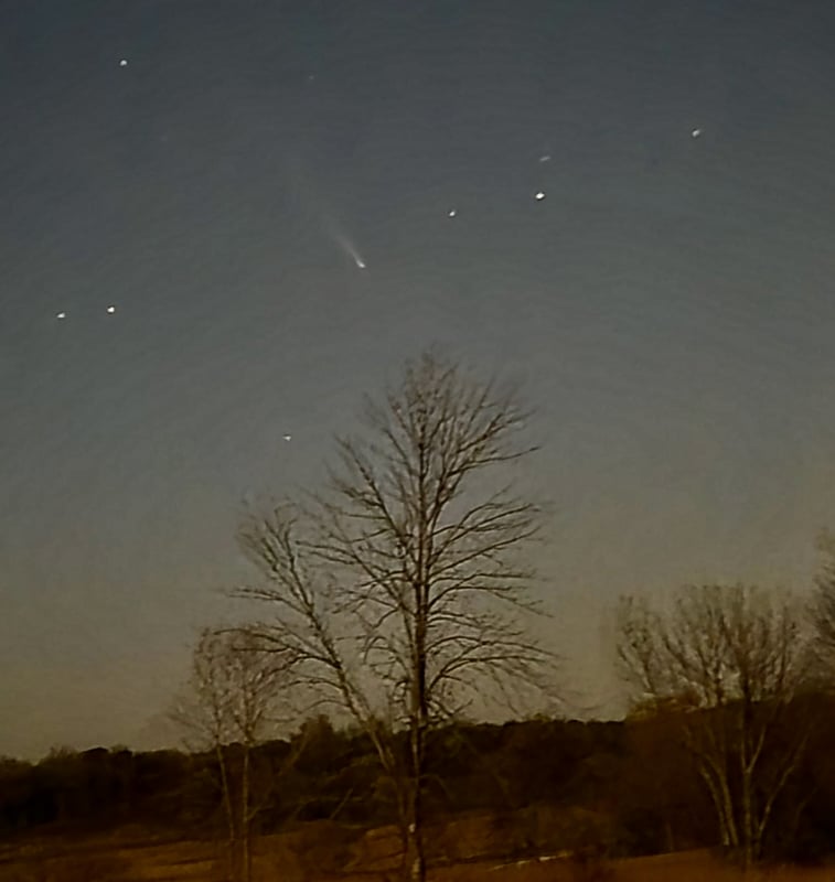 Comet C/2023 A3 (Tsuchinshan–ATLAS), which appeared, at least in the northern hemisphere, visible to the naked eye, about 45 minutes after sunset on the western horizon in early to mid-October 2024. I took this picture outside the Frontenac State Park office with my phone. Although it looks like twilight, it was actually completely dark at the time. / Photo by Steve Dietz