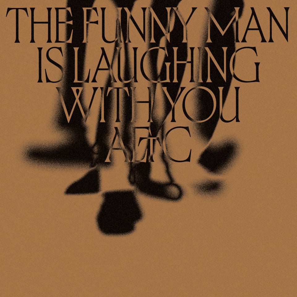 The cover artwork for The Funny Man is Laughing With You