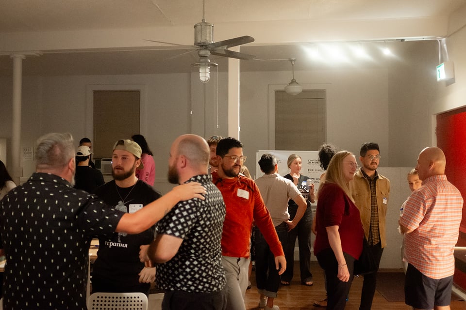 A group of people allegedly mingling.