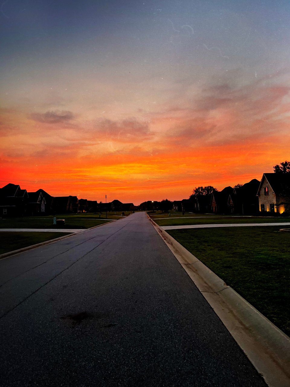 A middle Georgia street at dusk. Photo by me.