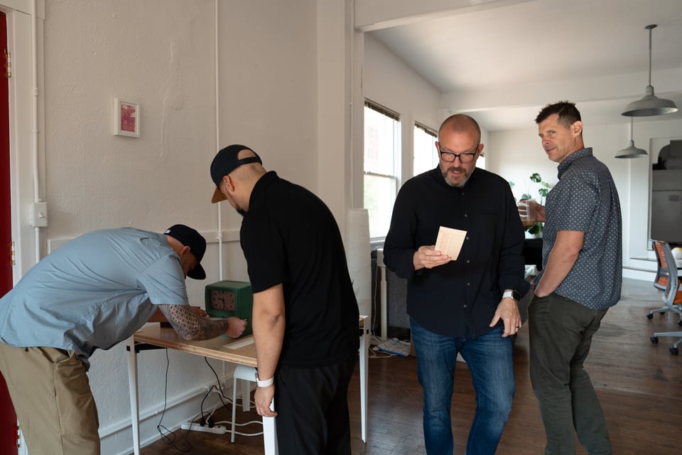A group of dudes clocking in.