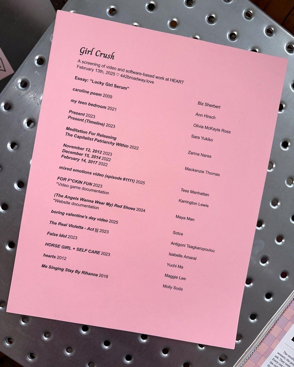 A pink printed program for the screening.