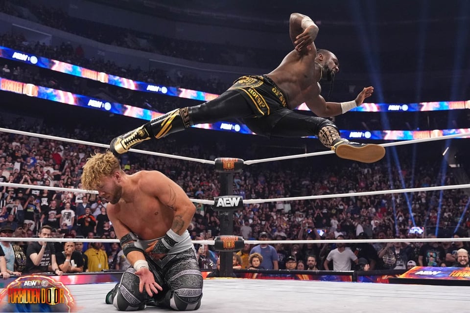 All Elite Wrestling's Swerve Strickland giving a "House Call" kick to Will Ospreay's head.