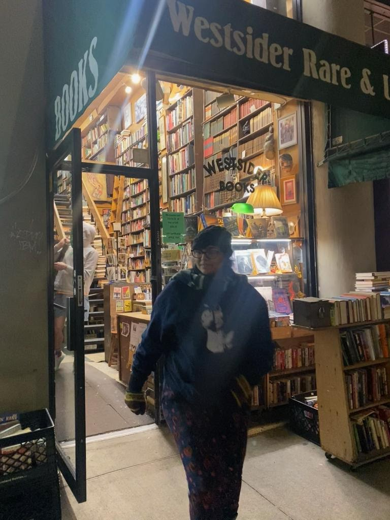 Priya Sridhar (me) is outside a New York bookstore called Westsider