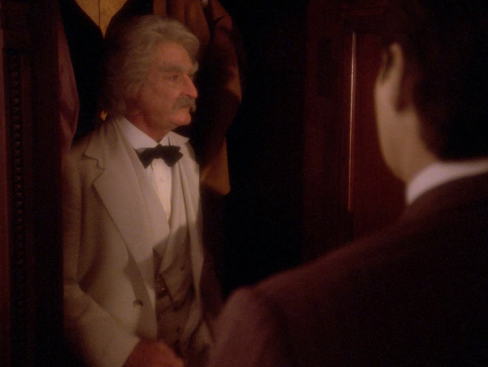 Data discovers Mark Twain hiding in his closet. This is the second time Twain has been caught eavesdropping.