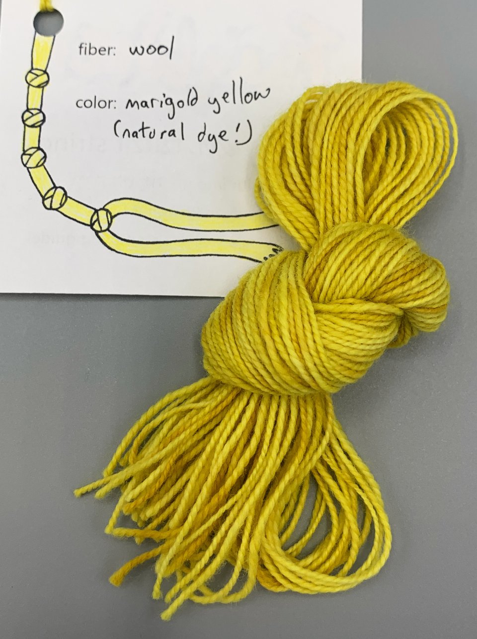 bundle of marigold yellow tzitzit strings.