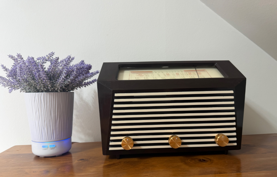 RCA Victor 9-X-651 — restored Bakelite radio with ivory grille slats and gold knobs, now running as a home NAS server