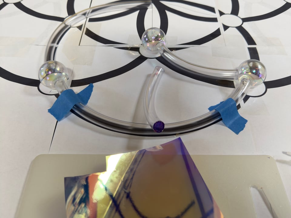 Tubing pieces with film and Christmas ornaments