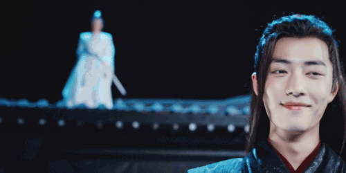 gif of live action wei wuxian smiling as he walks away