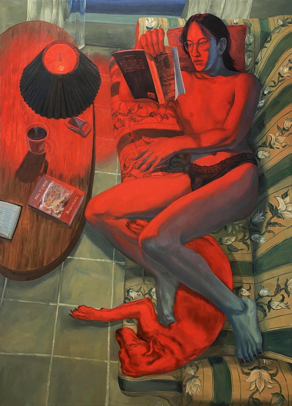 A painting of a person only wearing underwear, reading on a patterned couch next to their dog. All are bathed in a bright red glow. A painting by Amanda Ba, titled Lover; She is Reading.
