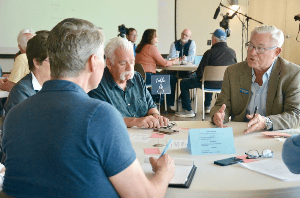 a group of people at the 2023 candidate speed dating event