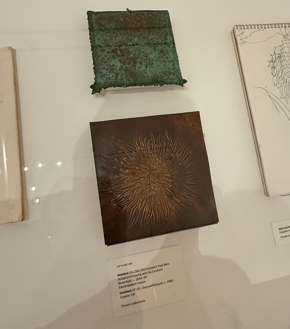 Copper sculpted plates by artist Ruth Asawa on display at MoMA, New York City, 2026