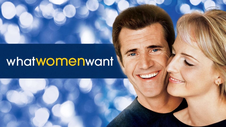 A poster for what women want, featuring a blue sparkly background, in front of which Mel Gibson is grinning with dead eyes, and Helen Hunt is nuzzling him with her eyes closed. She also has a very unconvincing grin.