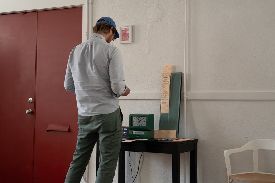 Another man punches in to visit.