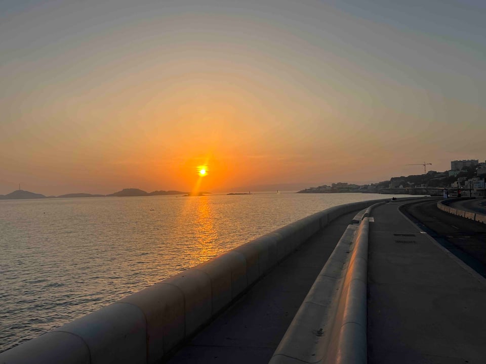 sunset against the coastline in marseille