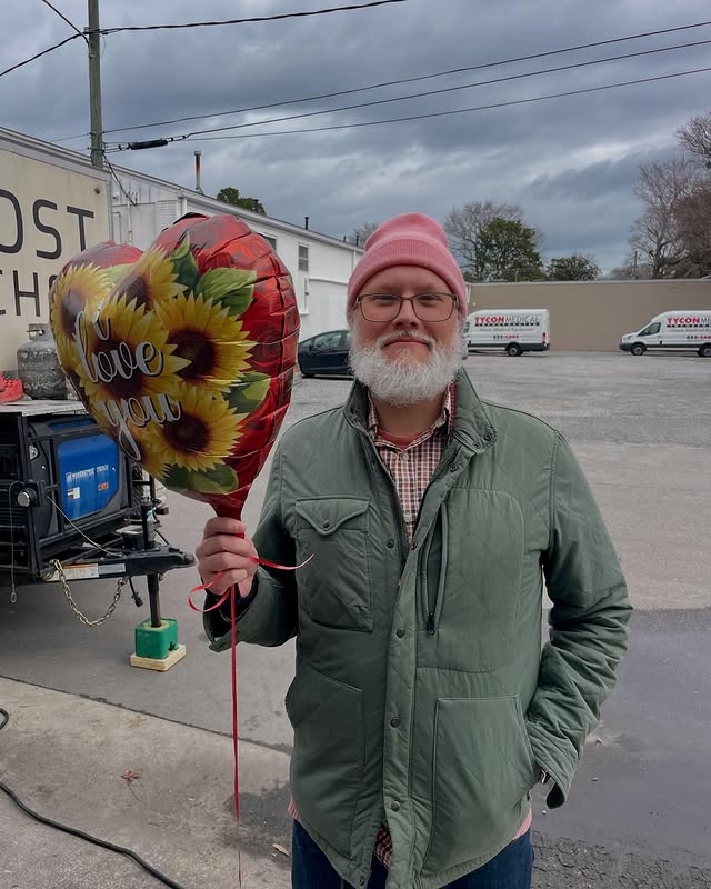 Me with a dumb beard and an "I LOVE YOU" balloon