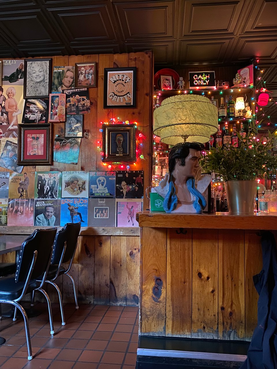 the inside of deluxe cafe, with elvis lamp