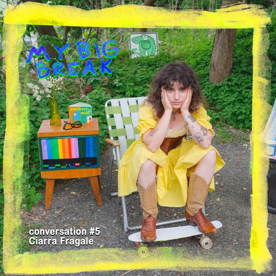 the musician Ciarra Fragale - sitting in a folding lawn chair in a yellow dress and cowboy boots, feet up on a little white 80s style skateboard