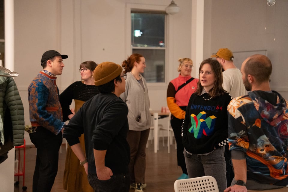 A group of people talking.