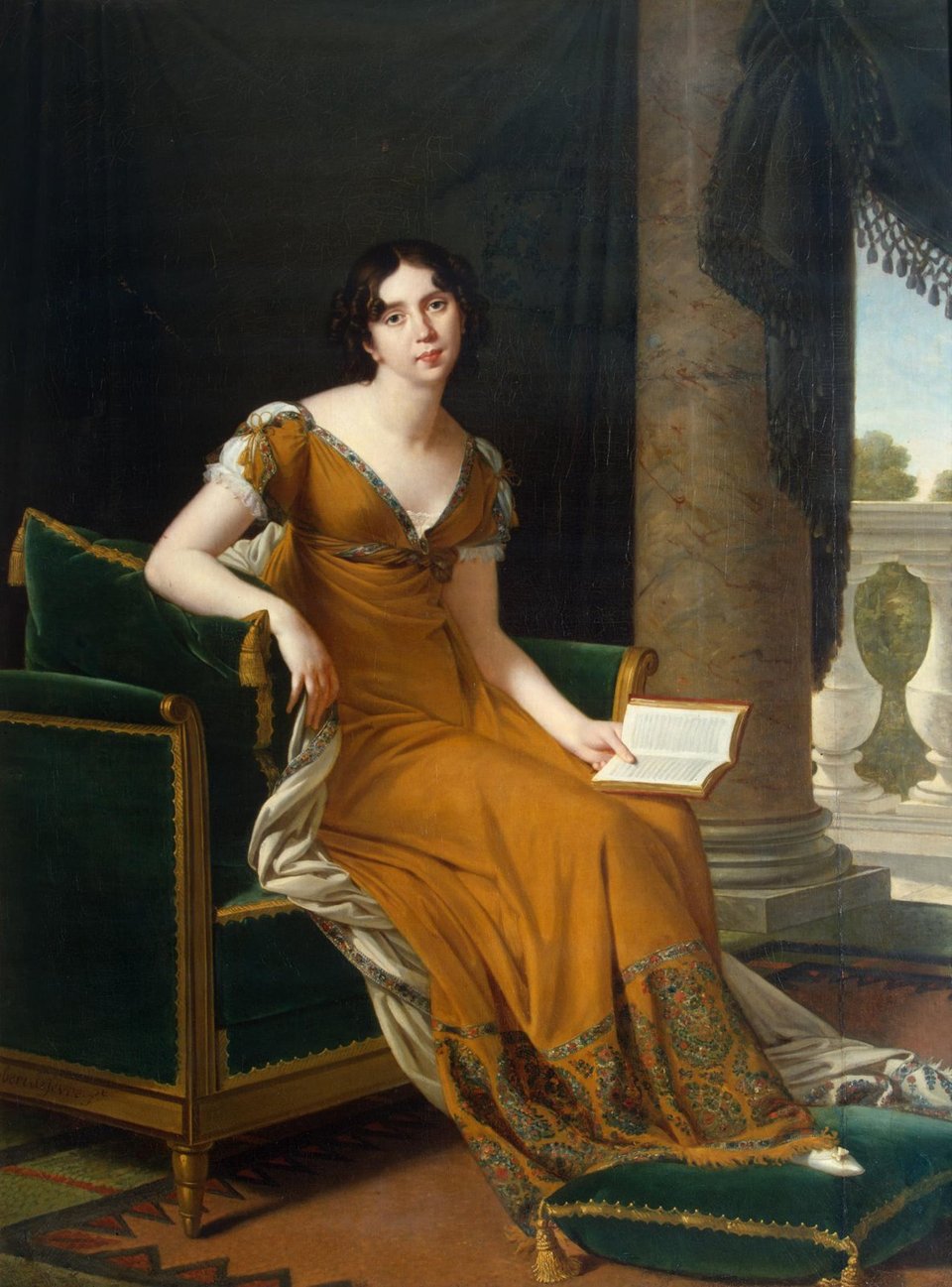 A painting of a young woman with very dark brown hair in a gown of orangish-tan. She is seated on a white shawl over a chair upholstered in green, the wood painted gold. Her foot is on a matching cushion. There is a massive marble colum behind her.