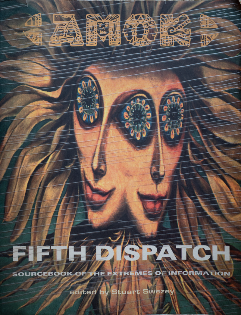 Photograph of a cover of a book. There is an illustration of a kind of two-headed sunflower being, sharing one eye. At the top is the word AMOK written in a stylized font; below, in sans serif, it says FIFTH DISPATCH: SOURCEBOOK OF THE EXTREMES OF INFORMATION edited by Stuart Swezey