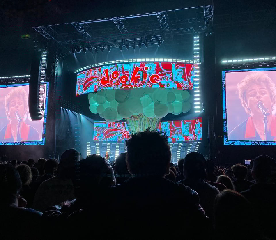a image of billie joe, lead singer of Green Day performing Dookie in San Diego in 2024