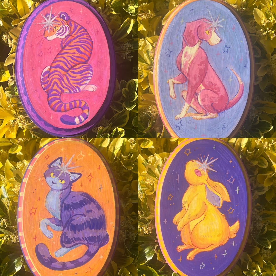 a collage of four photos of four oval-shaped paintings. first is a tiger on a pink background, second is a dog on a purple background, third is a cat on an orange background, and fourth is a rabbit on a purple background