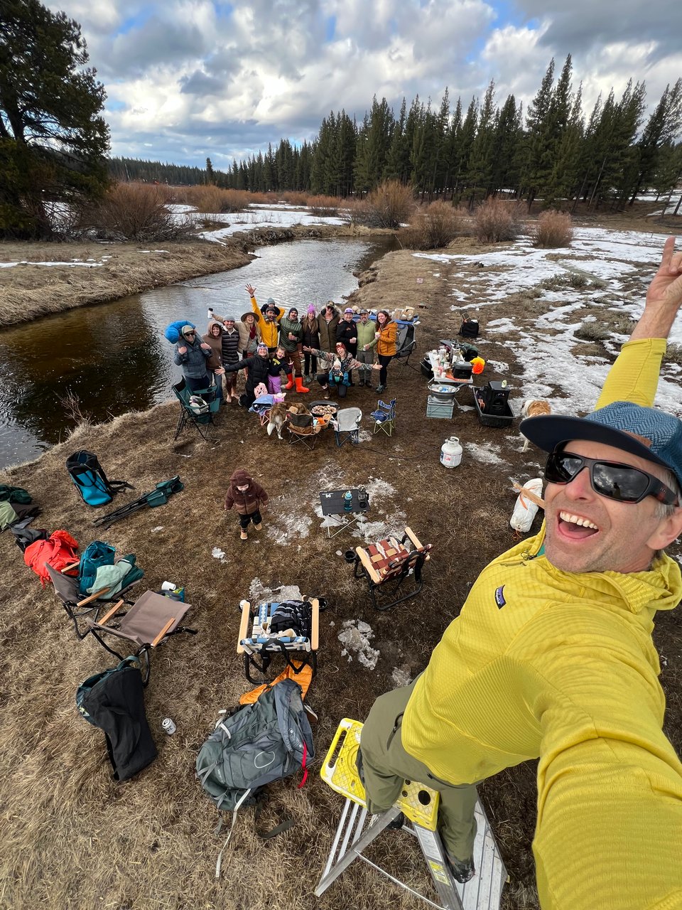 A bunch of friends at the meadow down the street