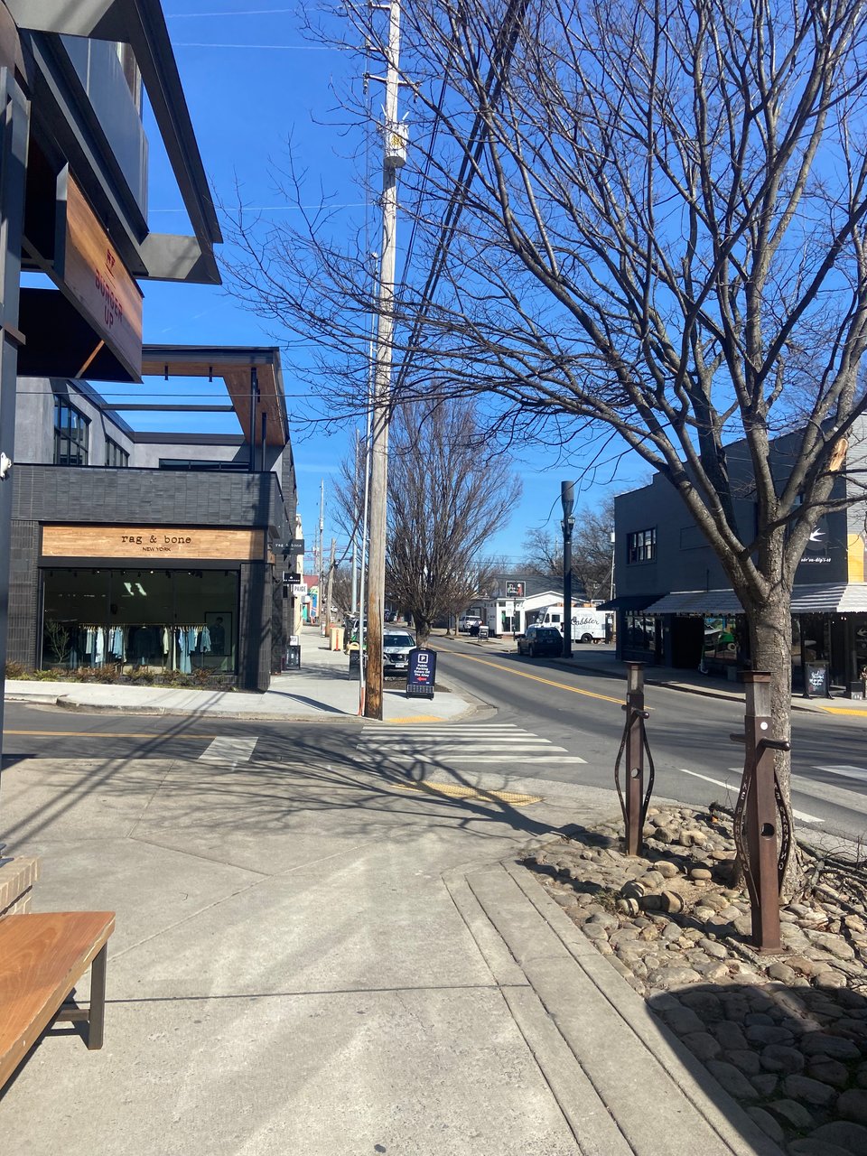 a bench in front of a store
