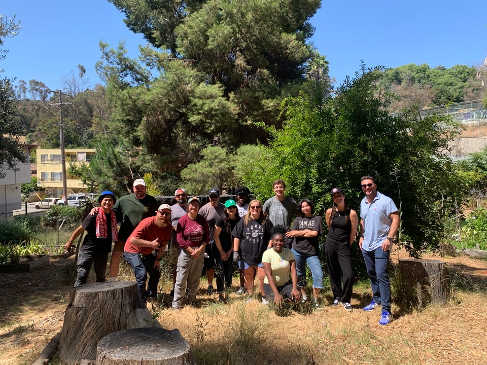 Photo of volunteers standing in front of trees at Solano Garden