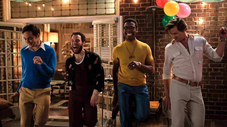 A scene from the Boy In the Bands where the characters are happily dancing.