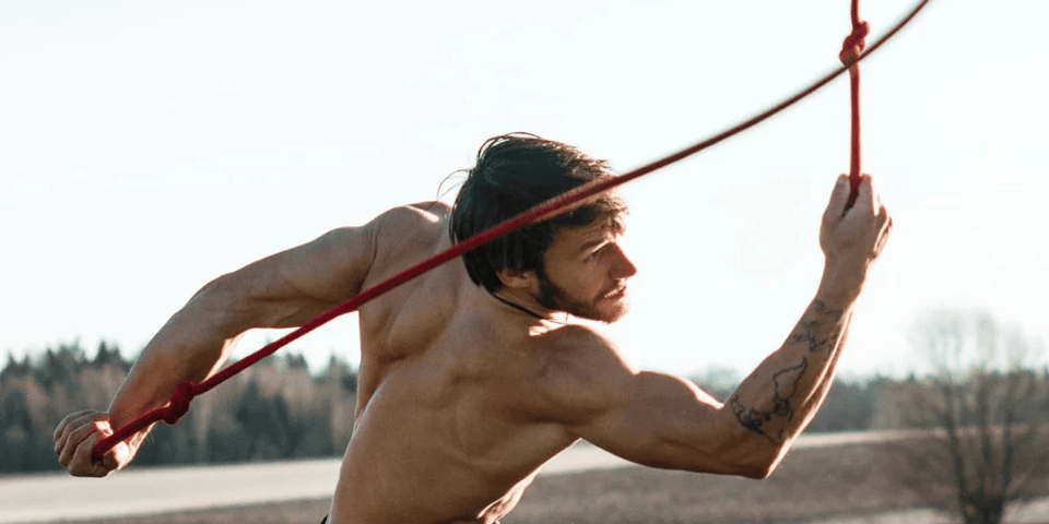 A very athletic chap does some rope swinging (not me).