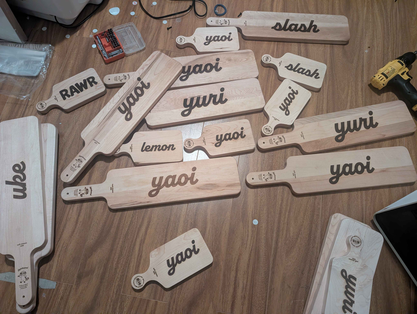A series of paddles scattered on the floor.