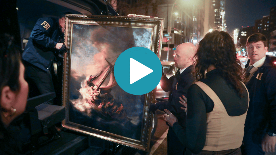 "FBI agents" load a "Rembrandt" into the back of their vehicle