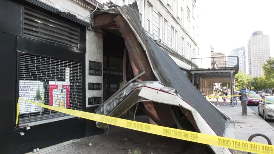 The collapsed awning of the Clark St Station entrance.