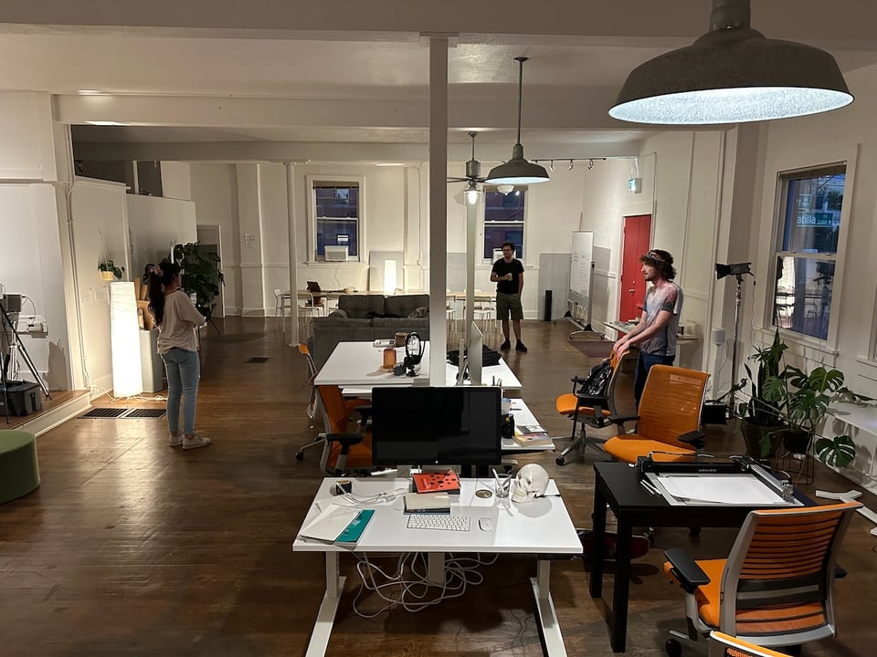 Three people having a conversation.