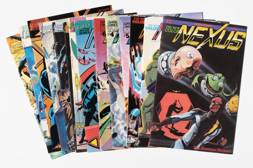 Nexus volume 2 1-14 arranged in a row