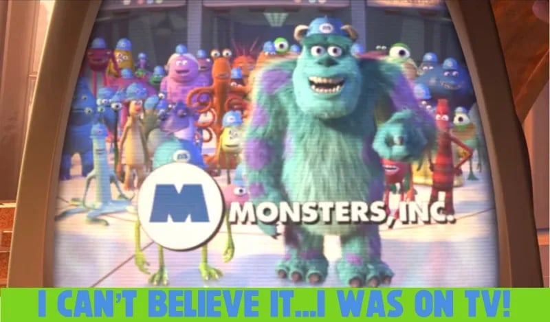 Still from Monsters, Inc., with end of advertisement for the company. Sully, a big blue and purple monster, is pointing at the camera and wearing a Blue Monsters Inc. helmet. Mike Wazowski, little green ball guy, is almost entirely covered by the company logo, except for his arms, legs, and helmet.