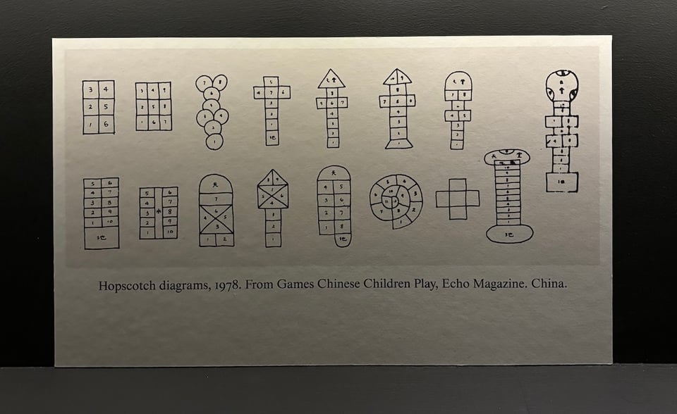 A print maybe A4 size, with sixteen different possible diagrams for a hopscotch-like game