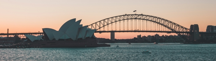 The Sydney Opera House and Sydney Harbour Bridge at sunrise/sunset