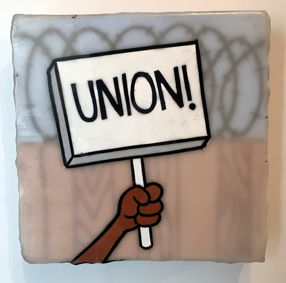 Painting of an arm holding a sign that says UNION in front of a barbed wire fence.