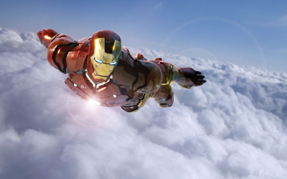 Iron Man soars above the clouds in his trademark red-and-gold armor