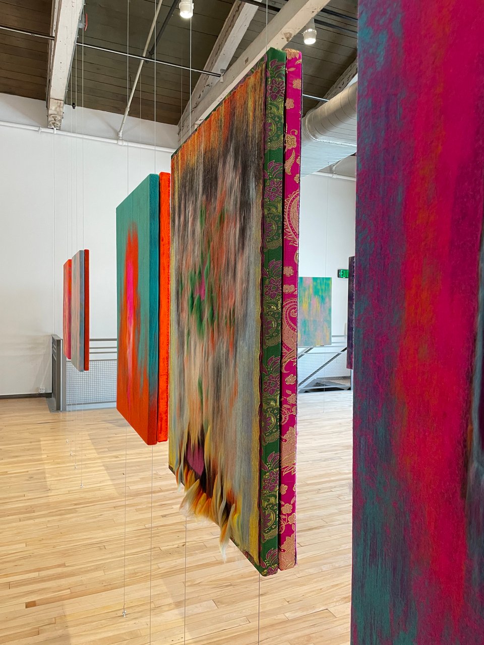 Several of the works in Gulnar Mukazhanova’s Portrait-Reflections (on the history of my homeland, Qandy Qantar 2022) arrayed in the gallery at Mass MoCA